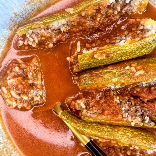 Kousa mahshi -stuffed squash with rice and meat cut in half